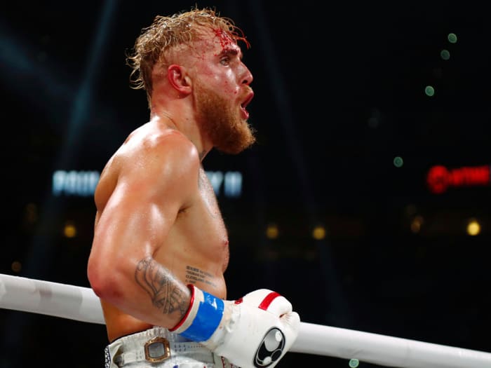 Jake Paul reacts during a fight against Tyron Woodley at Amalie Arena.